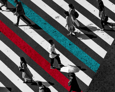 Overhead picture of people walking across a road