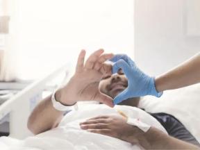 Kidney transplant patient in bed