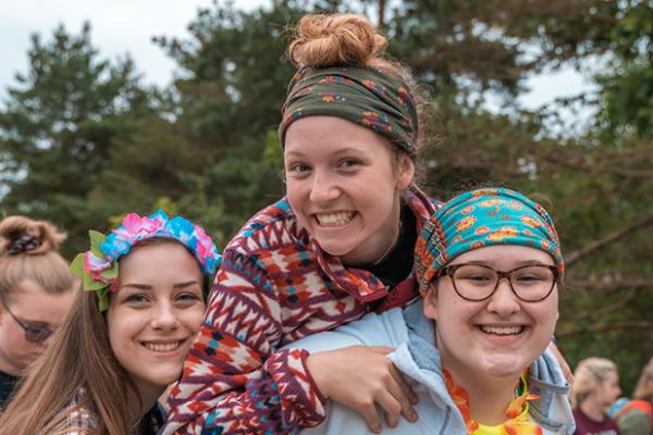 Three smiling teen girls at diabetes camp